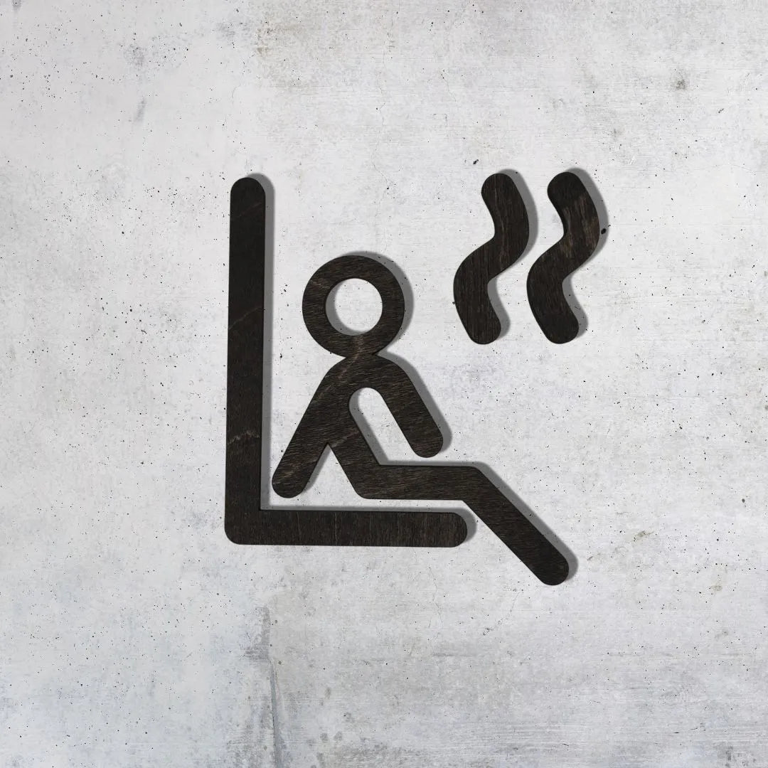 Puinen saunakyltti liiketilaan