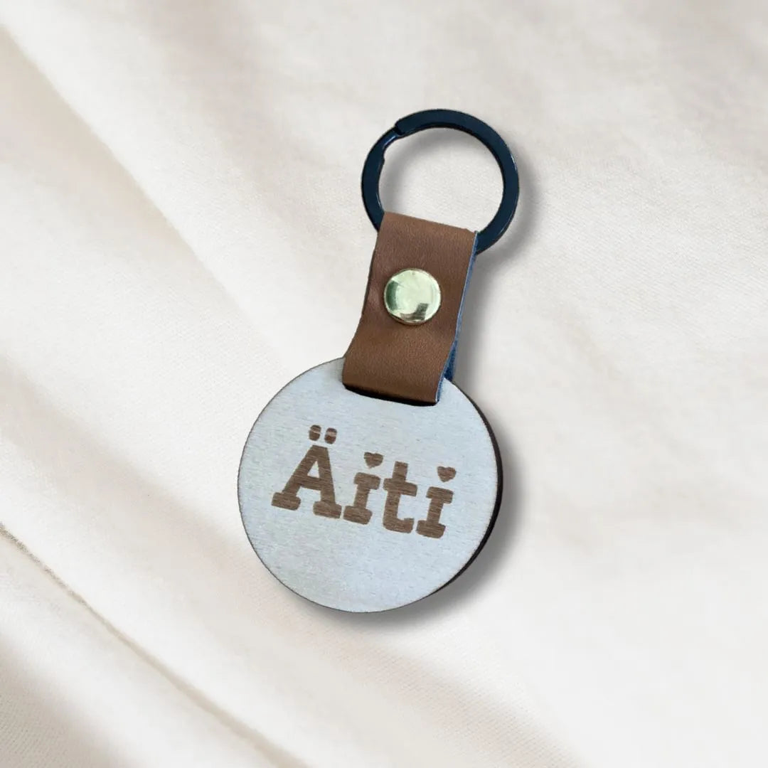 Personoitava avaimenperä lahjaksi.