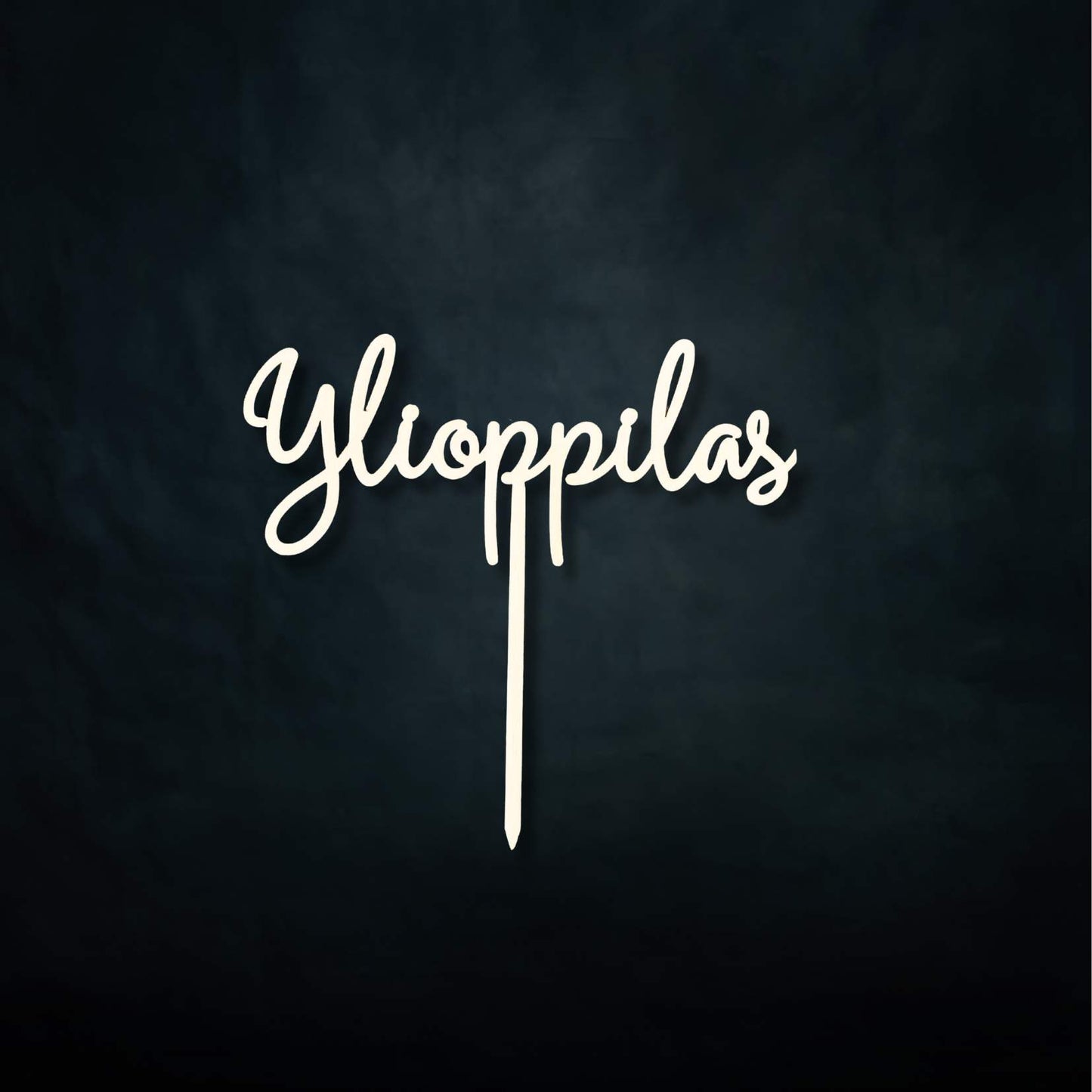 Puinen ylioppilas-kakkukoriste