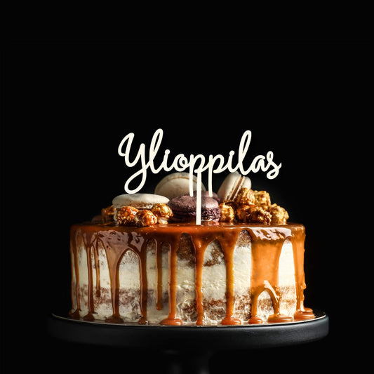 Puinen ylioppilas-kakkukoriste